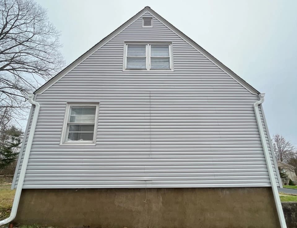 Willowick Power Washing technician performing detailed house washing in Willowick residential area